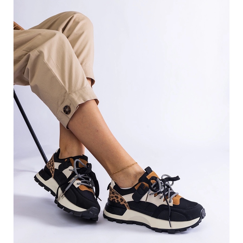 Black sneakers decorated with an animal motif 1 Black sneakers decorated with an animal motif 1