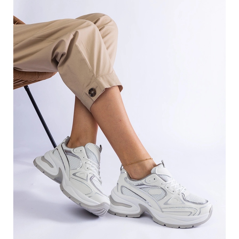 White sneakers on a massive sole 1 White sneakers on a massive sole 1