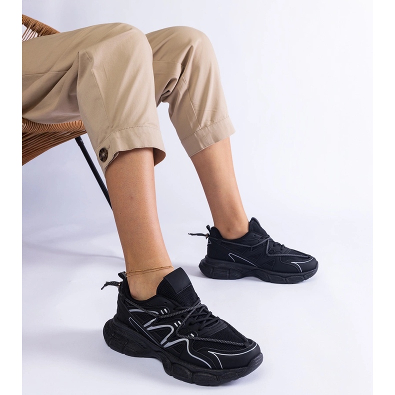 Black women's sneakers on a massive sole 1