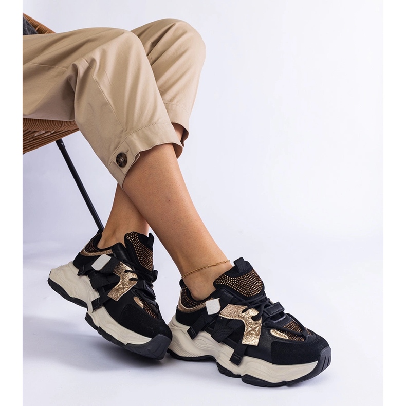 Black sneakers with gold inserts 1