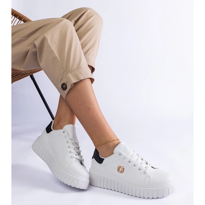 White and white sneakers on a thick sole 1