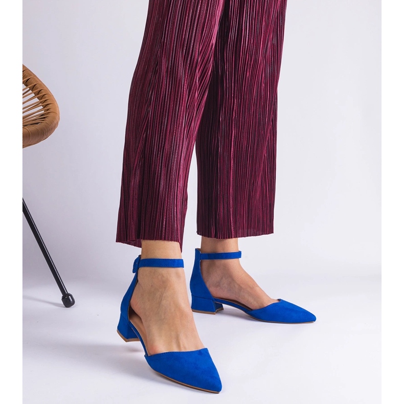 Blue sandals on a low post 1