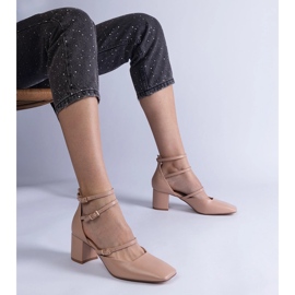 Beige high-heeled pumps with buckles 1