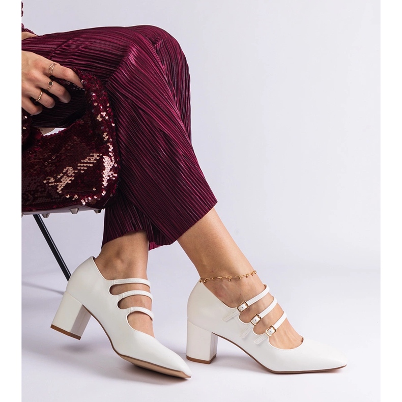 White high-heeled pumps with decorative buckles 2