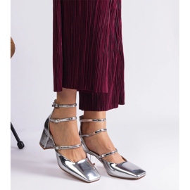 Silver pumps varnished on a post with buckles 1 Silver pumps varnished on a post with buckles 1