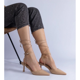 Beige high heels with an open heel, tied around the ankle 2