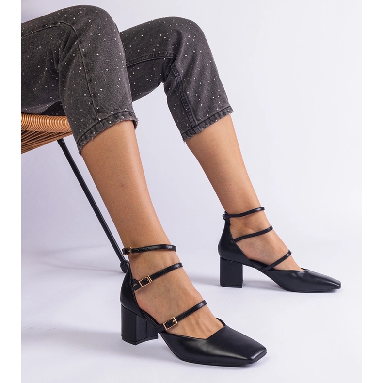 Black pumps on the pillar with buckles 1