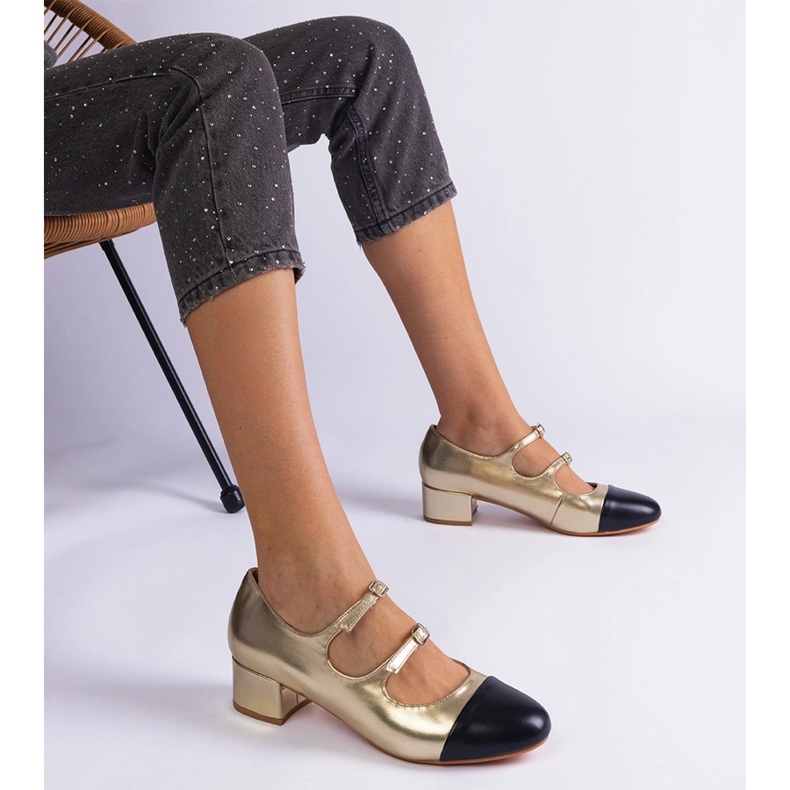 Golden pumps on the black nose 1