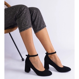 Black pumps on the eco-leather pillar 2