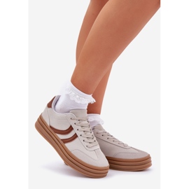 Stylish sneakers on the gray platform grey 1