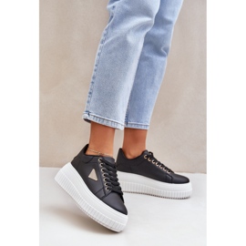 Stylish sneakers on a massive black and white platform 2