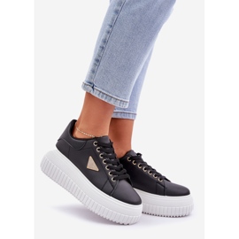 Stylish sneakers on a massive black and white platform 1