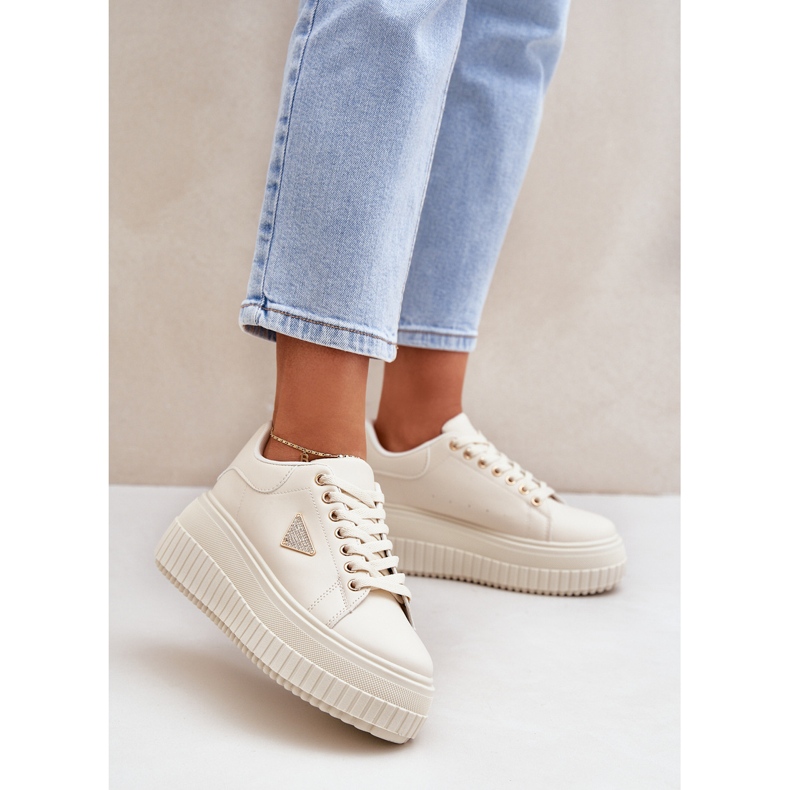 Stylish sneakers on a massive light beige platform 2