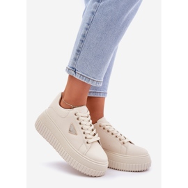 Stylish sneakers on a massive light beige platform 1