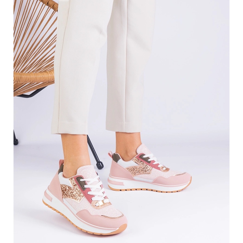 Pink sneakers on the platform decorated with glitter 1