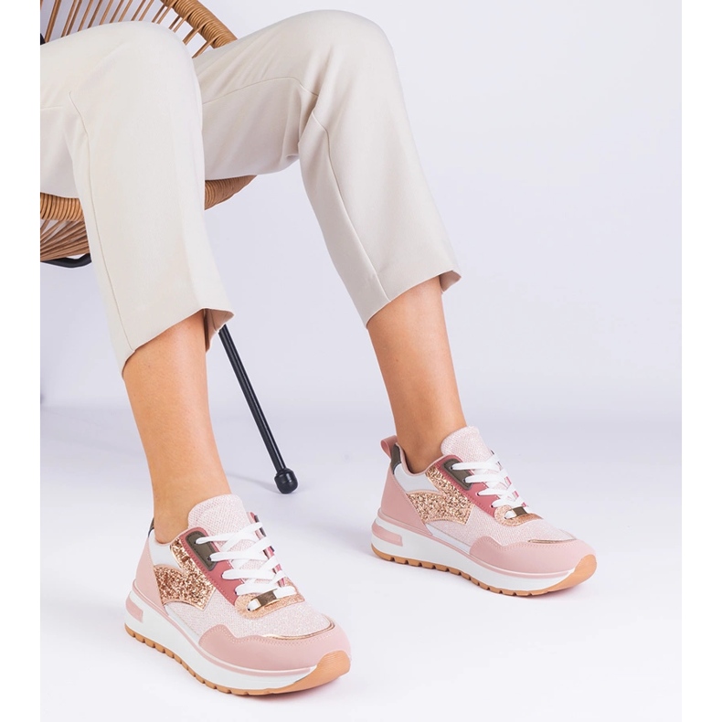 Pink sneakers on the platform decorated with glitter 2