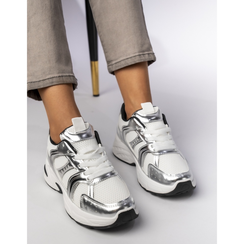 Women's silver sneakers on the platform 2