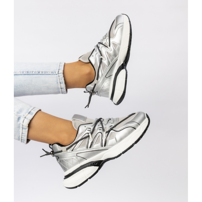 Women's silver sneakers on the platform 2