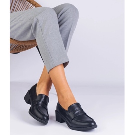 Black eco -leather pumps on a low post 2 Black eco -leather pumps on a low post 2