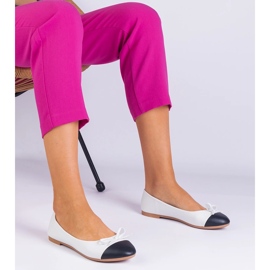 White ballerinas with a bow and a black nose 2