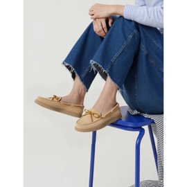 Women's beige suede loafers with a bow 1