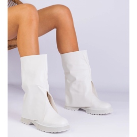 White boots with a broken upper 1
