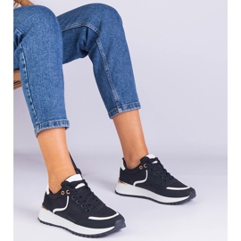 Black women's sneakers with a golden insertion 1 Black women's sneakers with a golden insertion 1