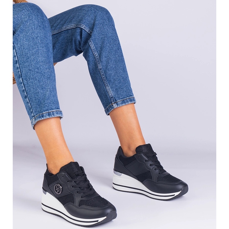 Black women's sneakers decorated with a metallic insert 1 Black women's sneakers decorated with a metallic insert 1