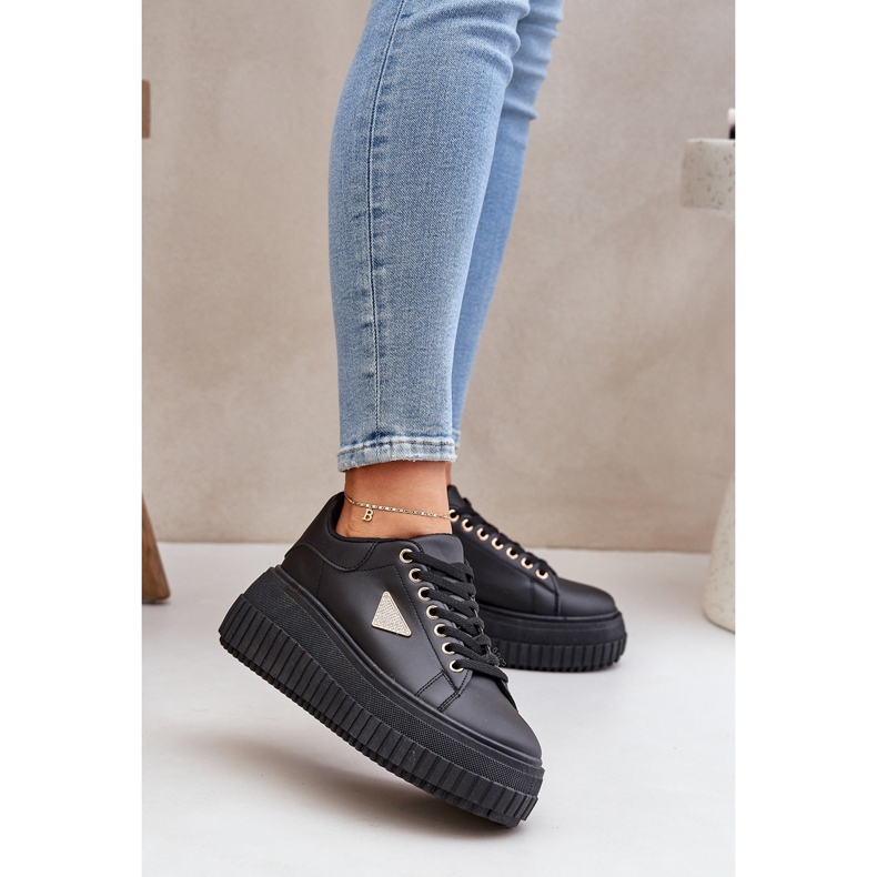 Stylish sneakers on a massive black platform 2