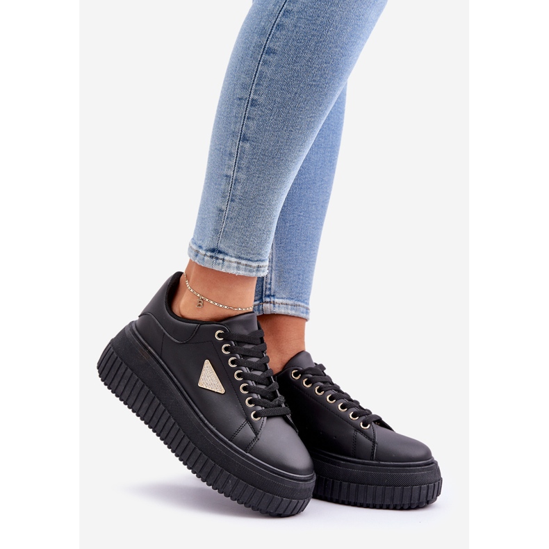 Stylish sneakers on a massive black platform 1