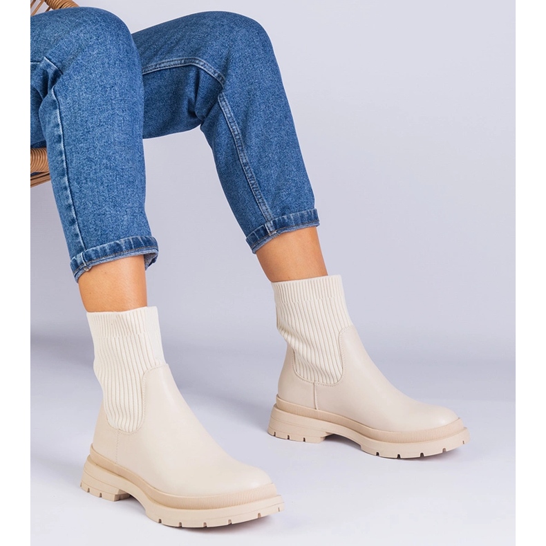 Beige ankle boots with a fabric upper 1