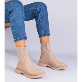 Brown boots with a material beige upper 1 Brown boots with a material beige upper 1