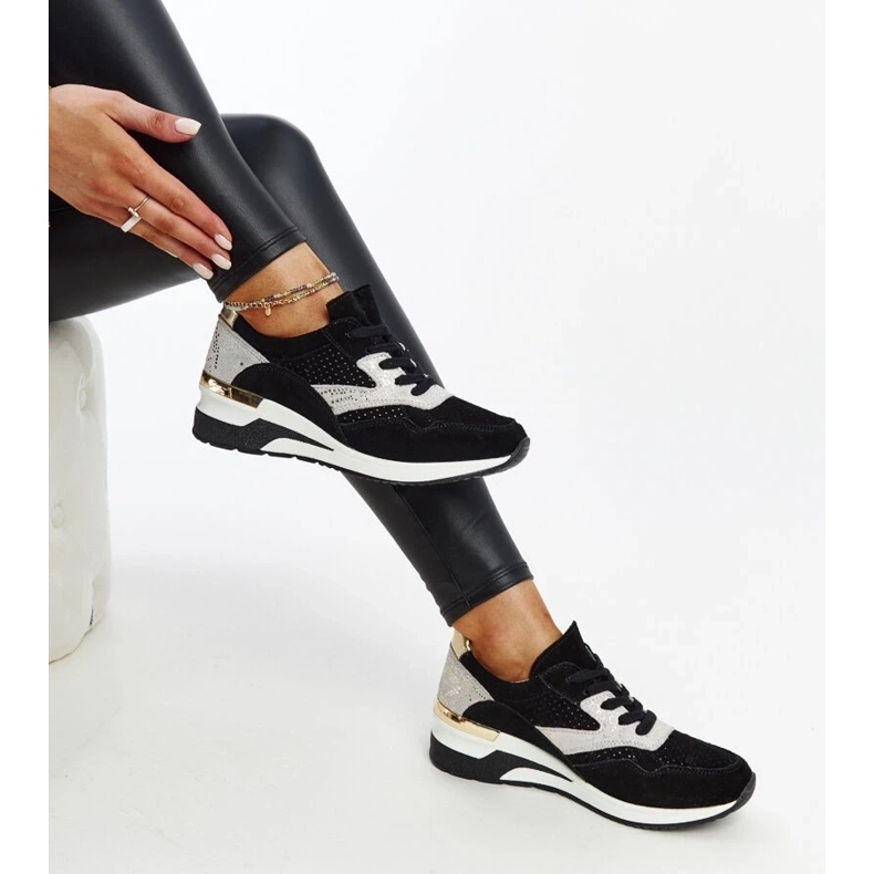 Black leather sneakers on the Manfrin wedge 2 Black leather sneakers on the Manfrin wedge 2