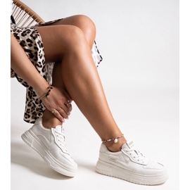 Beige leather sneakers on a thick aria sole 2