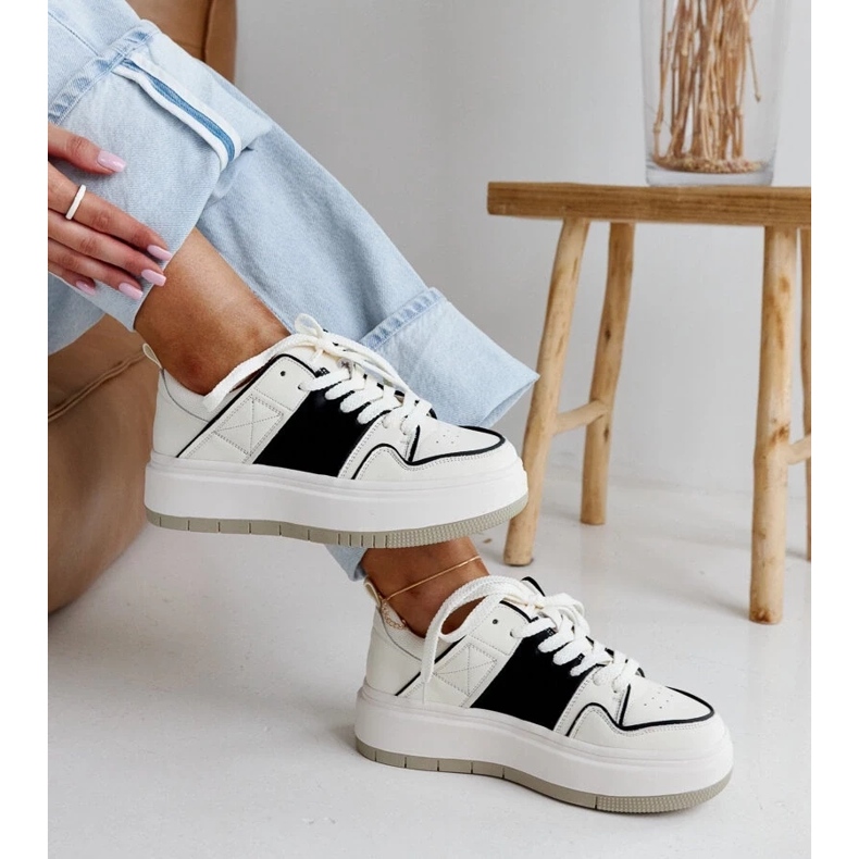 White and white leather sneakers on the thick sole of Abrar 2