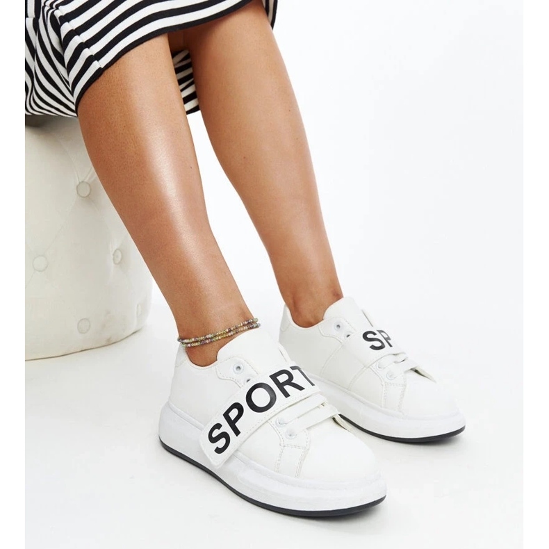 White sneakers on the Ayna platform 1