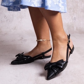 Ballet flats with a pointed toe and a Barira bow black 1