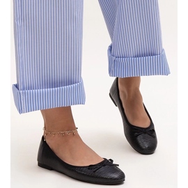 Black ballet flats with a bow and a leather insert by Rosaly 1