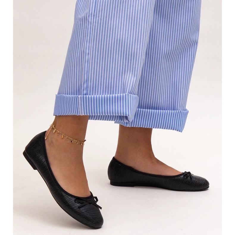 Black ballet flats with a bow and a leather insert by Rosaly 2
