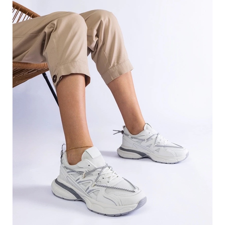 D/CEO White women's sneakers on the massive sole of the Colunga 1