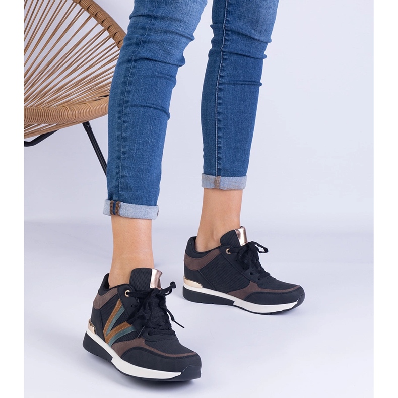 Black women's sneakers on a hidden wedge 1 Black women's sneakers on a hidden wedge 1