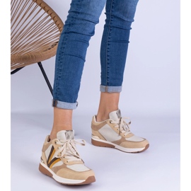 Brown women's sneakers on a hidden wedge 1
