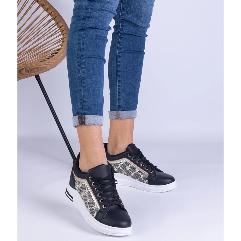 Black women's sneakers on a hidden wedge 1