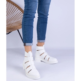 White boots with eco -leather with flat -heeled cutouts 1 White boots with eco -leather with flat -heeled cutouts 1