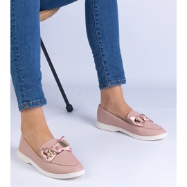 Pink loafers decorated with a bow and a golden teddy bear 1