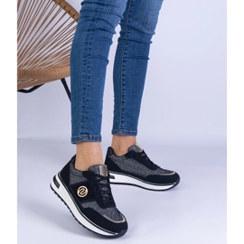 Black sneakers shiny with a golden decoration 1