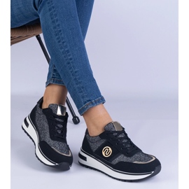 Black sneakers shiny with a golden decoration 2
