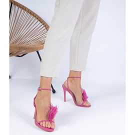 Pink sandals on a pin with feathers 1