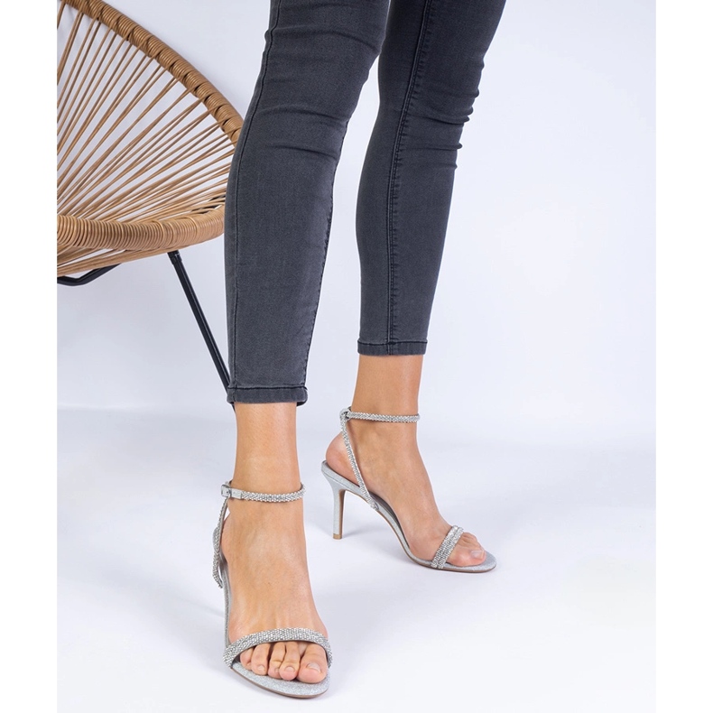 Silver elegant sandals on a high heel decorated with zircons 1