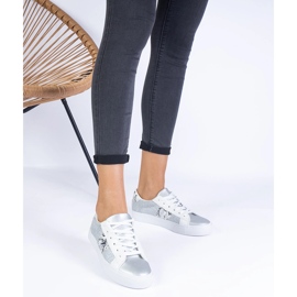 Silver sneakers with an animal motif decorated with glitter 1